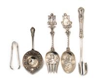 An American Sterling Silver Serving Spoon, retailed by Marshall Field & Co., Height of first 8 1/2 inches.