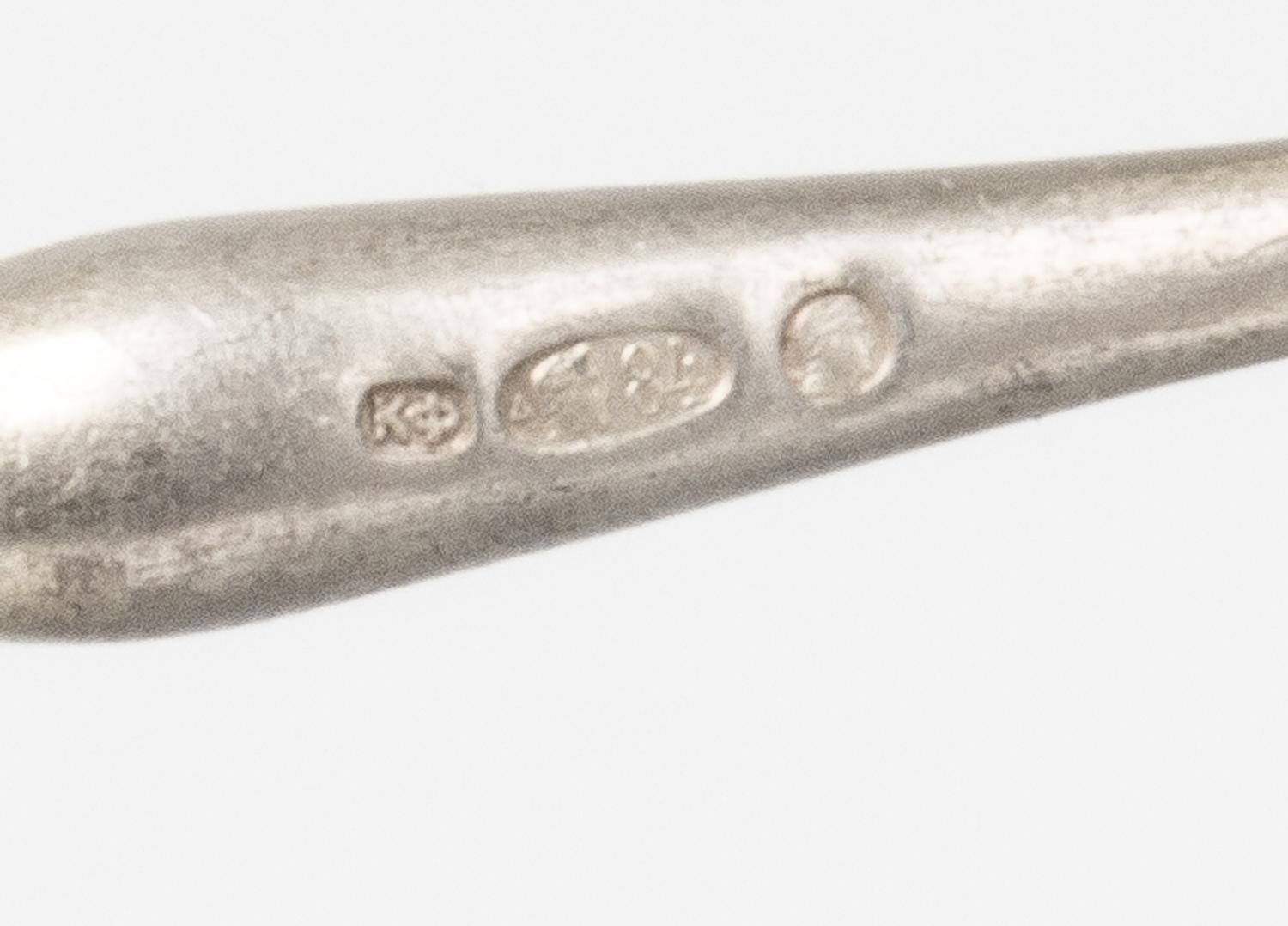 A Group of Russian Silver Flatware, Mark of Karl Faberge, St. Petersburg, the handles with tied garland terminals, comprising: 3 table