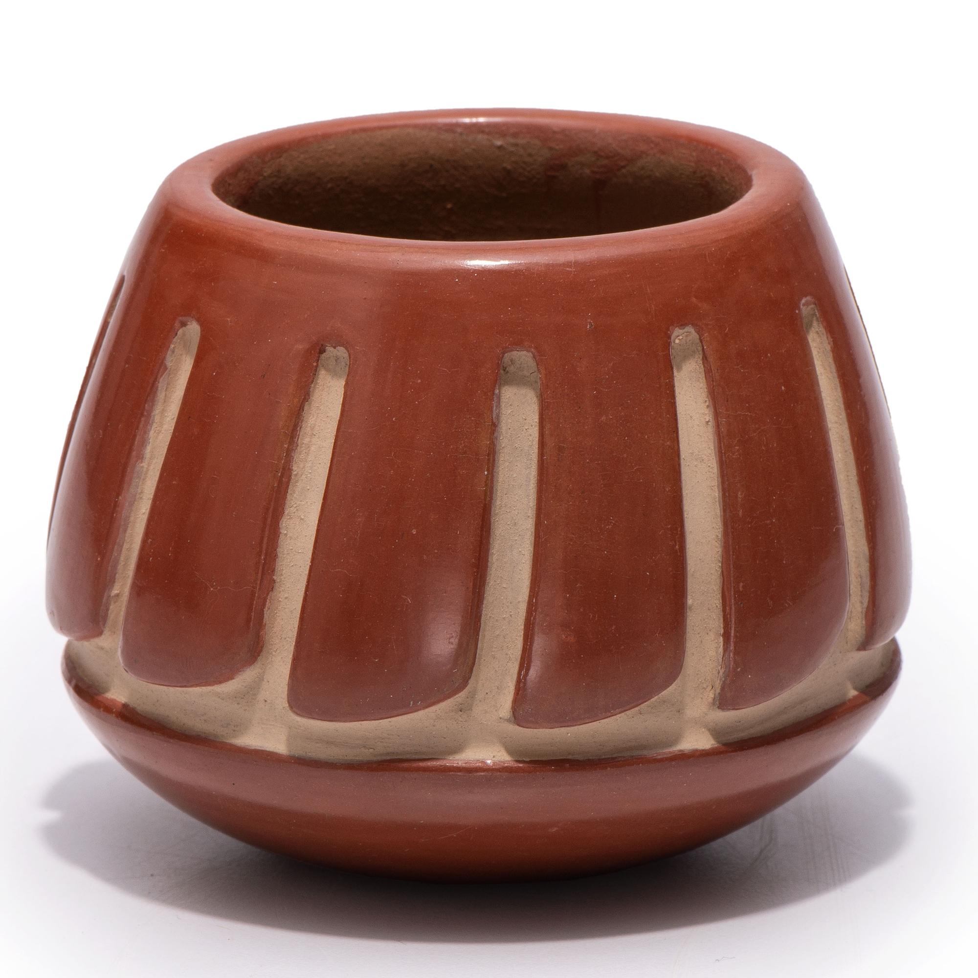 Carved Redware Jar, with Repeating Feather Design