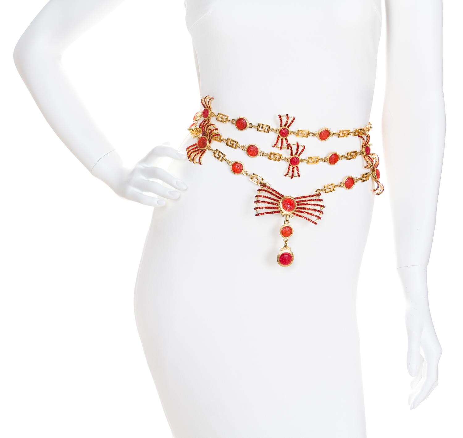 A Gianni Versace Runway Red Medallion and Rhinestone Bow Belt, Chain: 69"- 73"; Pendant: 3.75" x 1.75".
