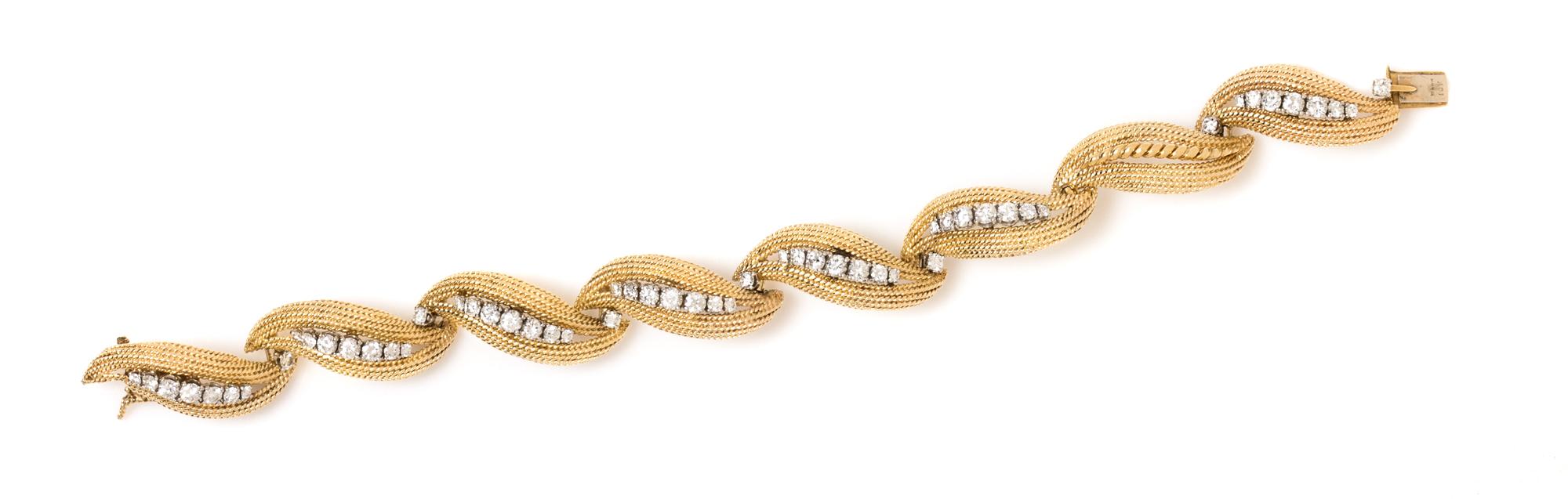 An 18 Karat Bicolor Gold and Diamond Bracelet, David Webb, 24.80 dwts.