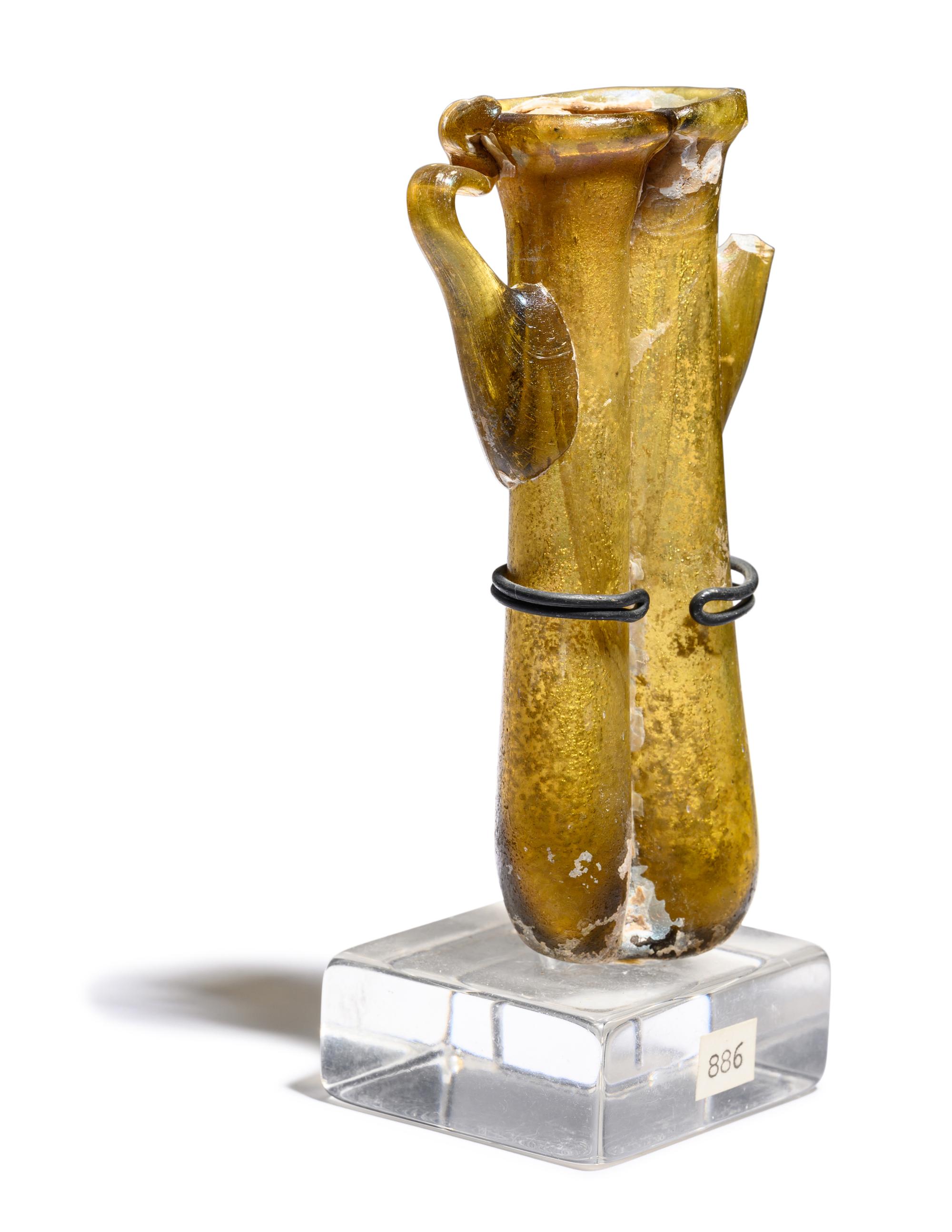 A Roman Yellow-Green Glass Double Unguentarium