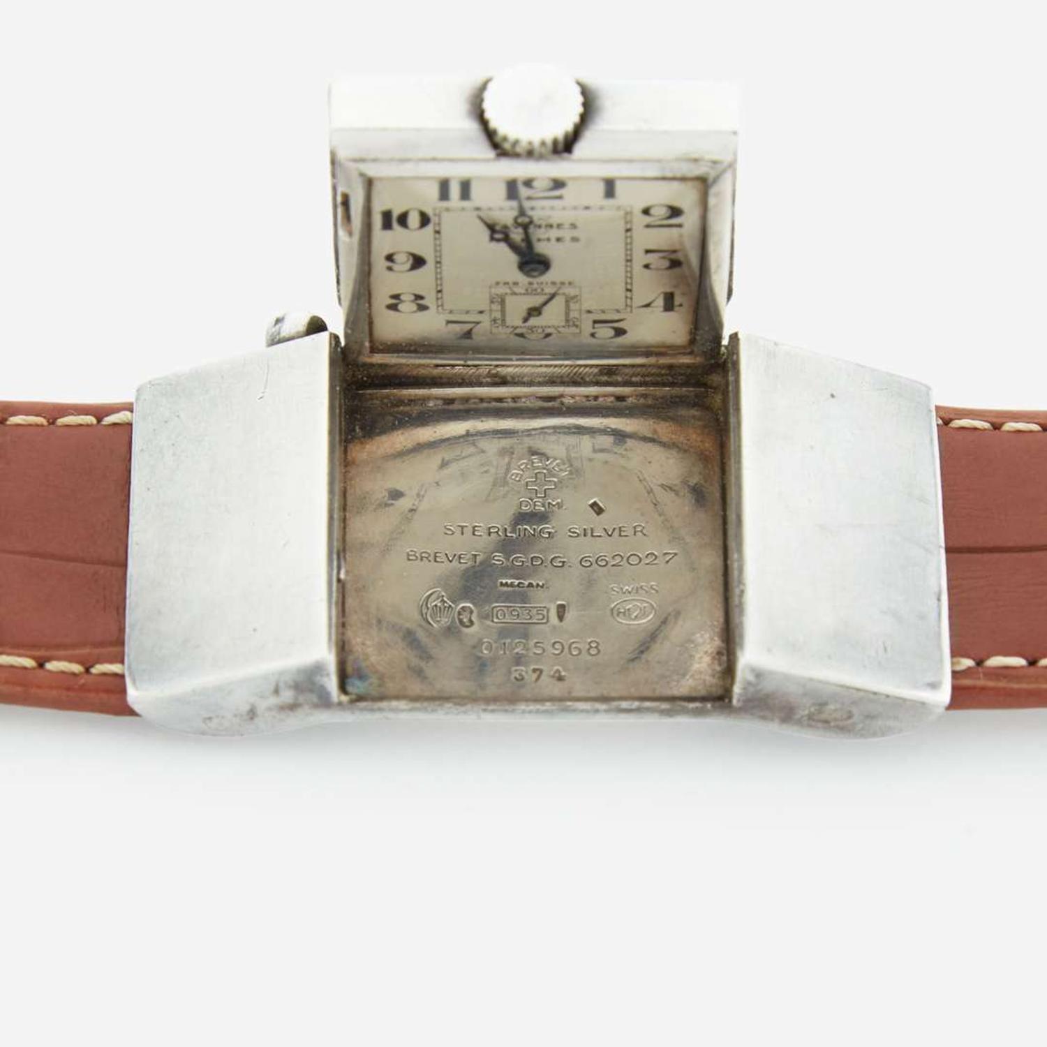 A sterling silver golf belt watch, Hermes C.1920