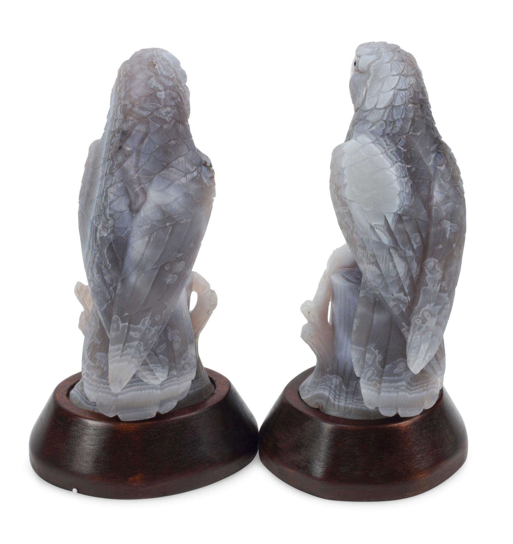 A Pair of Carved Hardstone Models of Parrots