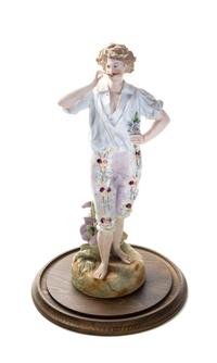 A Continental Bisque Porcelain Figure, Height 17 1/2 inches.