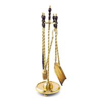 A Brass Fireplace Fender and Fireplace Tools