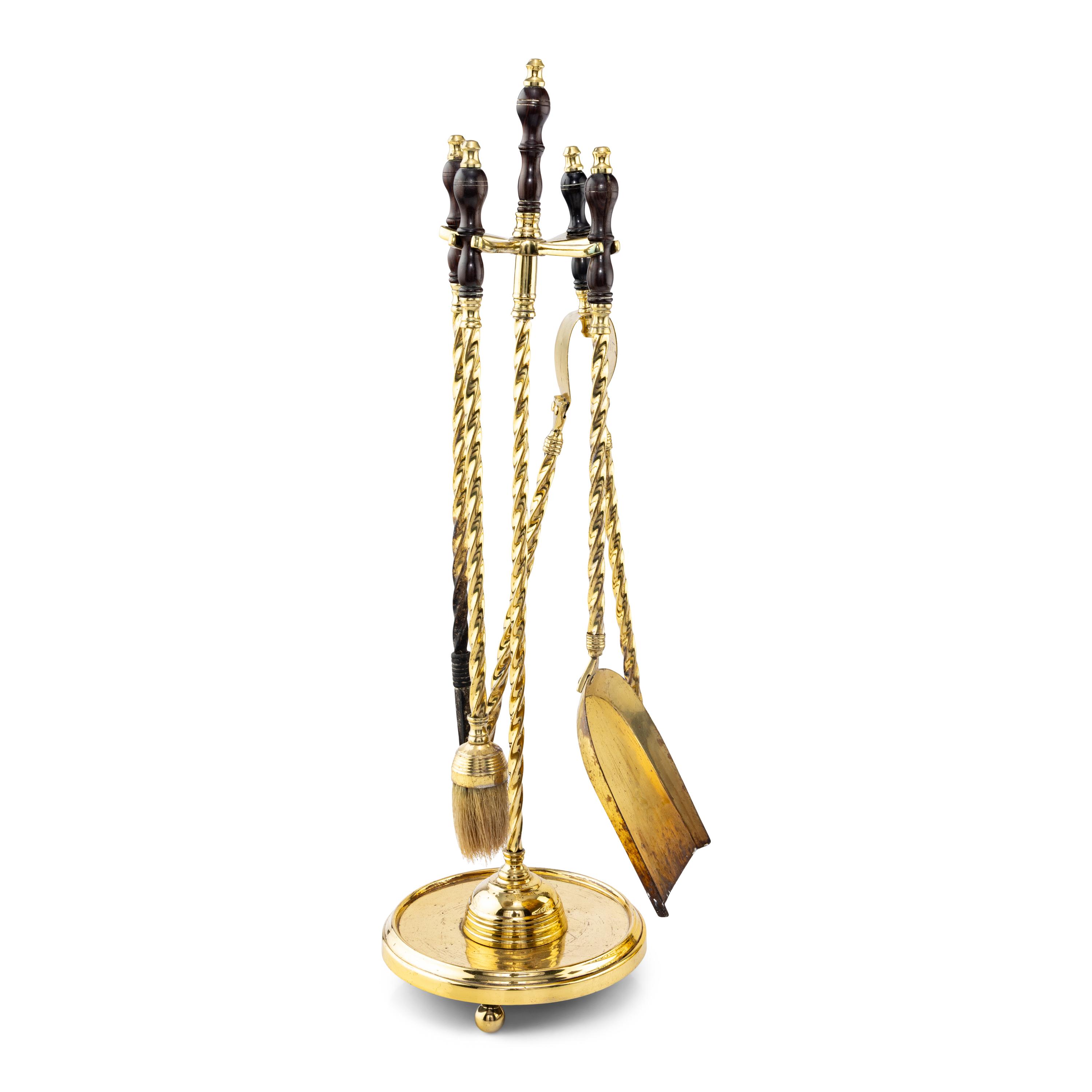 A Brass Fireplace Fender and Fireplace Tools