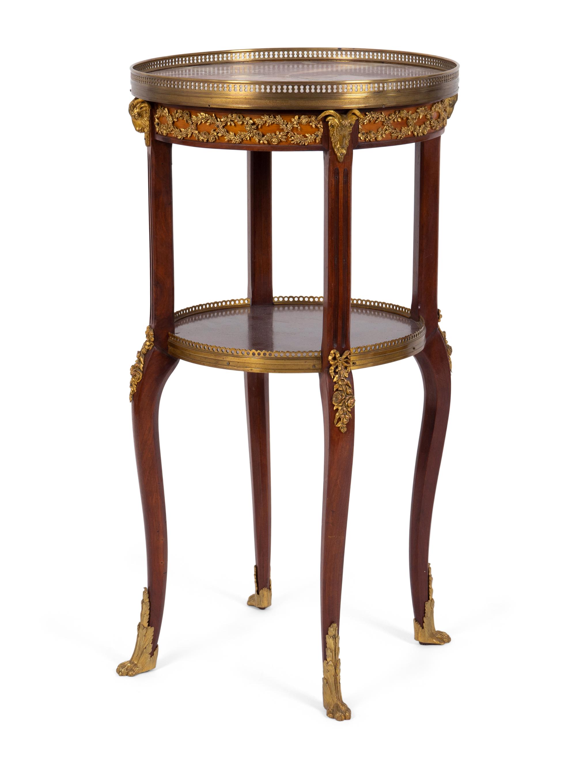 A Louis XV/XVI Transitional Gilt Metal Mounted Marble Top Two-Tier Gueridon — 19TH CENTURY