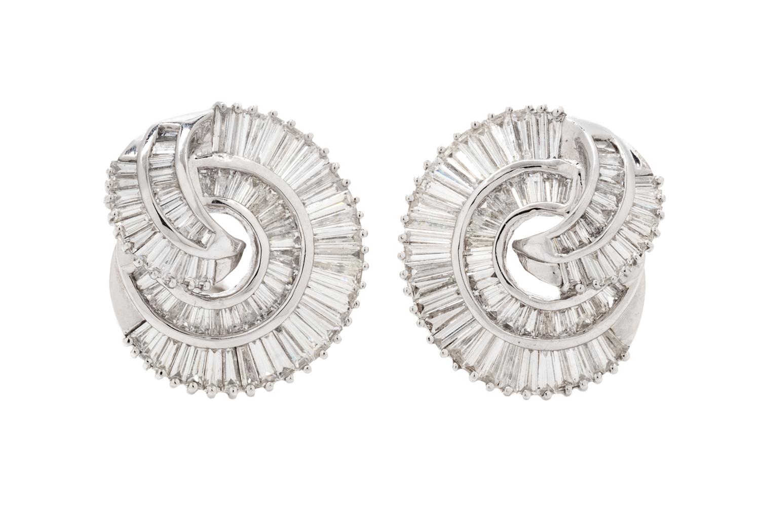 A Pair of 18 Karat White Gold and Diamond Earclips, 8.85 dwts.