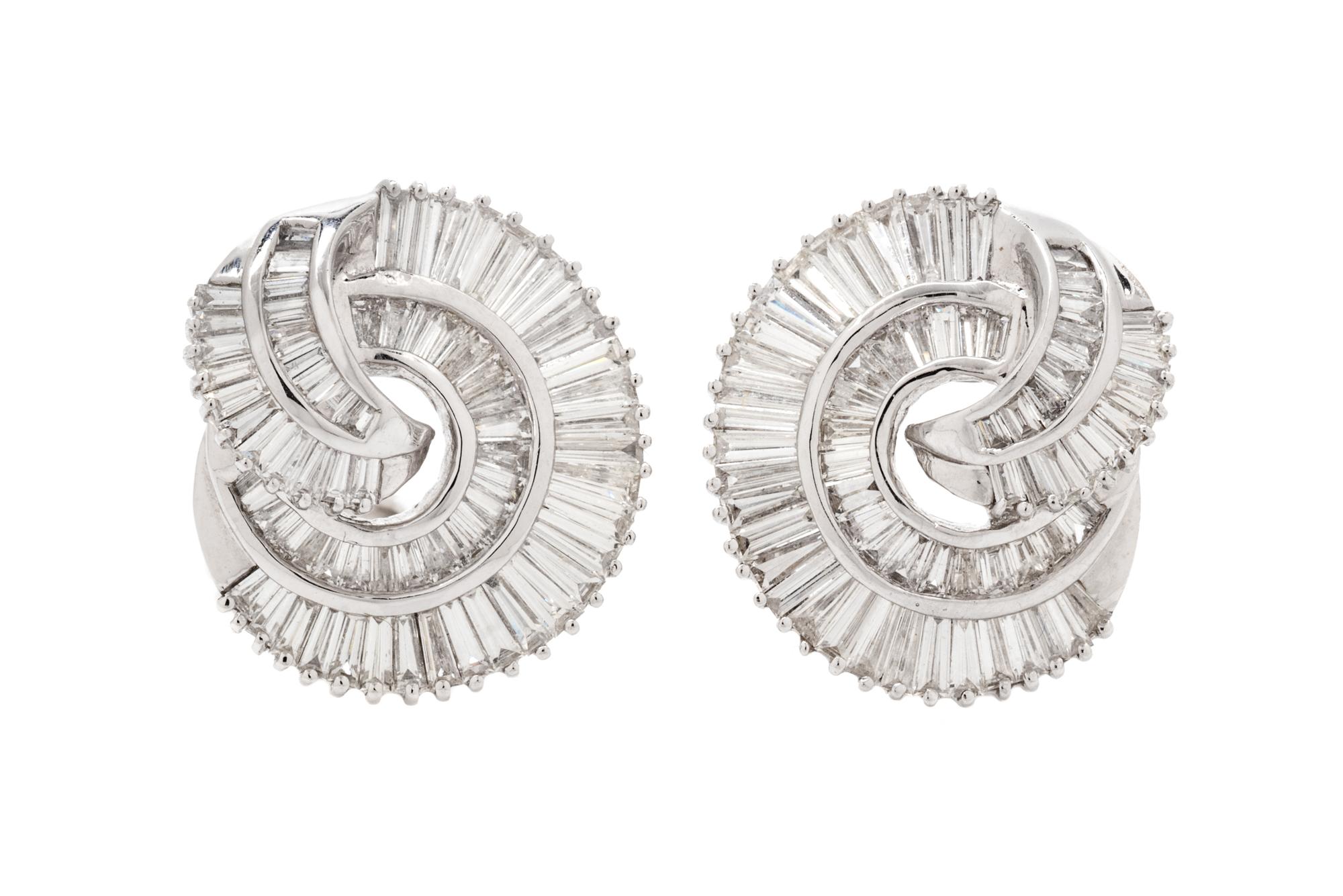 A Pair of 18 Karat White Gold and Diamond Earclips, 8.85 dwts.