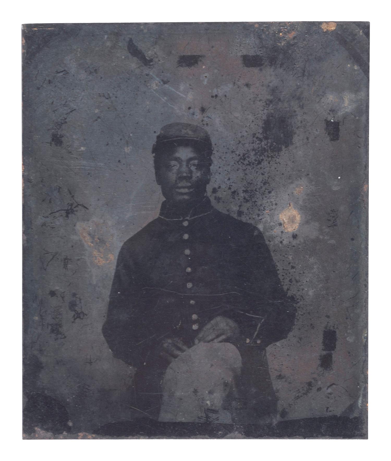 [CIVIL WAR]. Tintype of African American cavalryman, likely taken in the field.