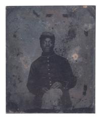 [CIVIL WAR]. Tintype of African American cavalryman, likely taken in the field.