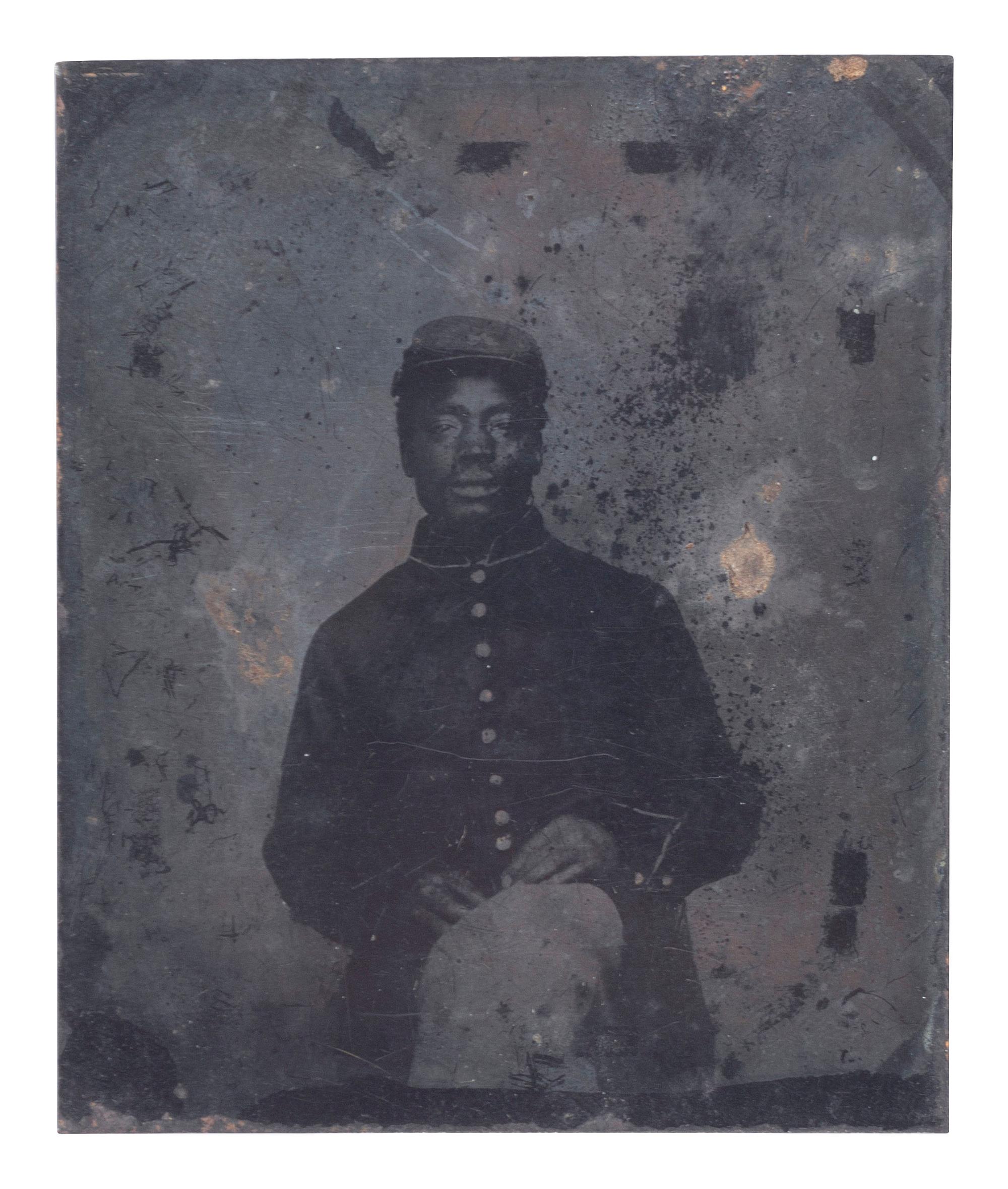 [CIVIL WAR]. Tintype of African American cavalryman, likely taken in the field.
