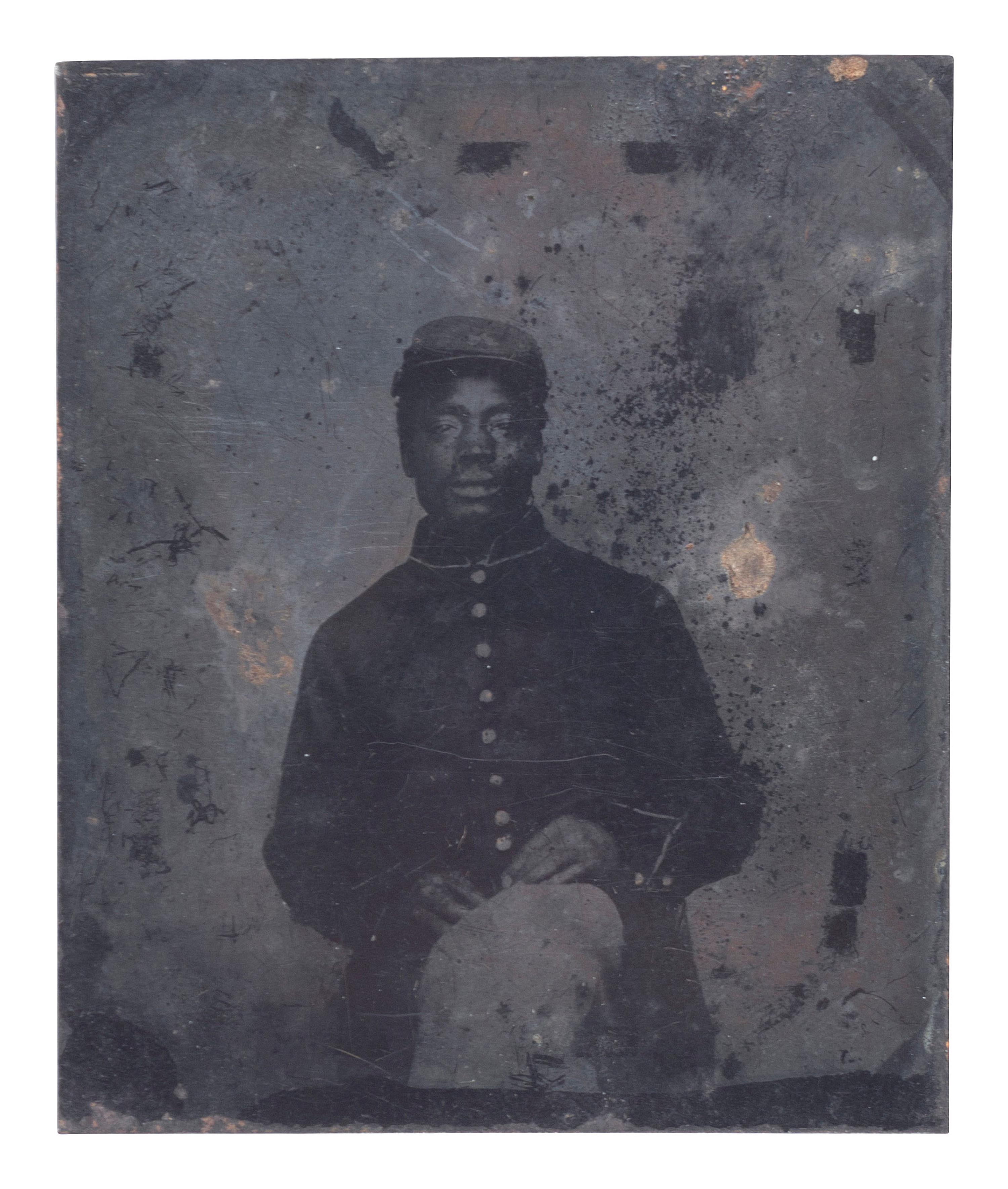 [CIVIL WAR]. Tintype of African American cavalryman, likely taken in the field.