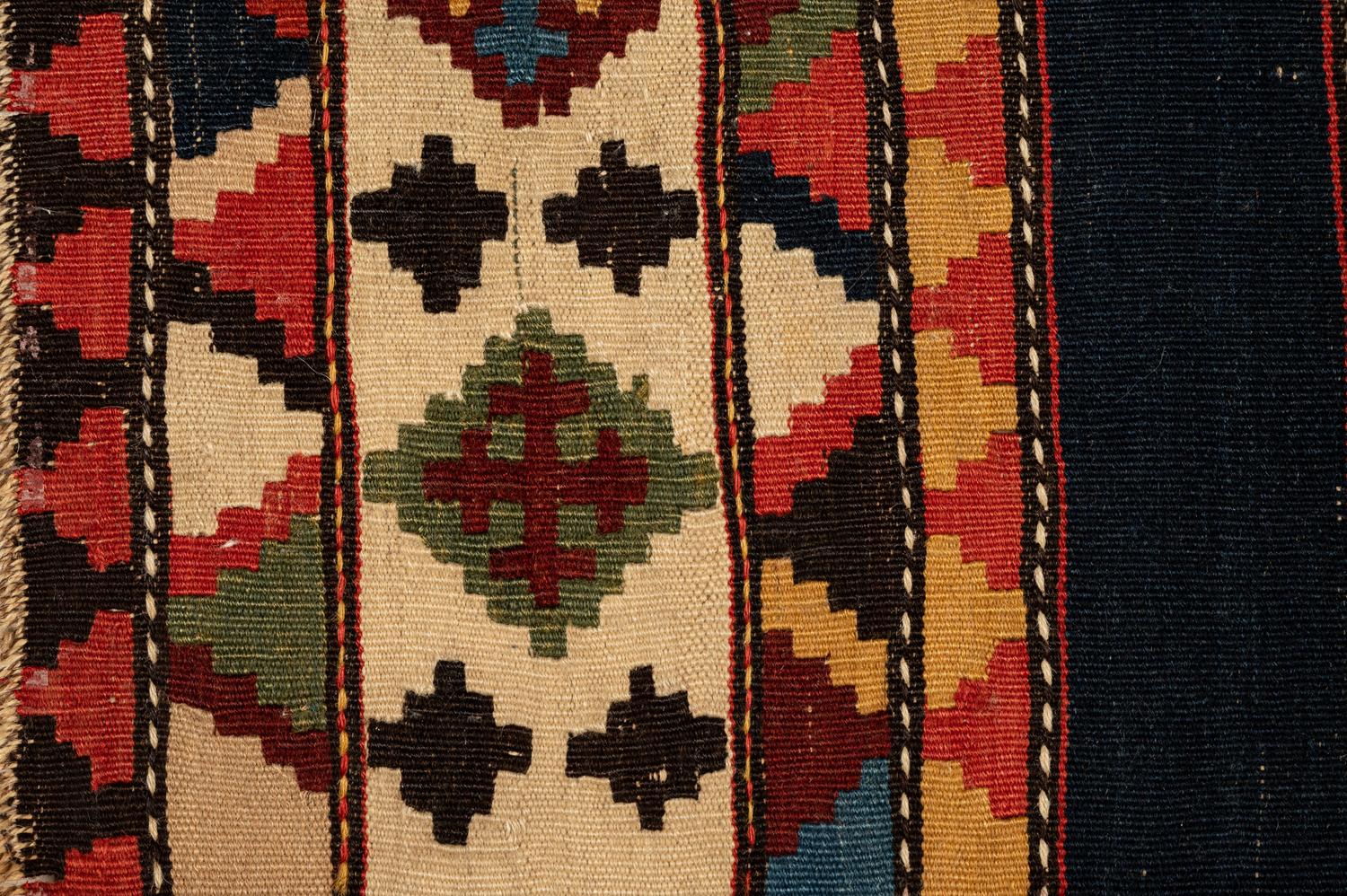 A Group of Three Kilim Rugs