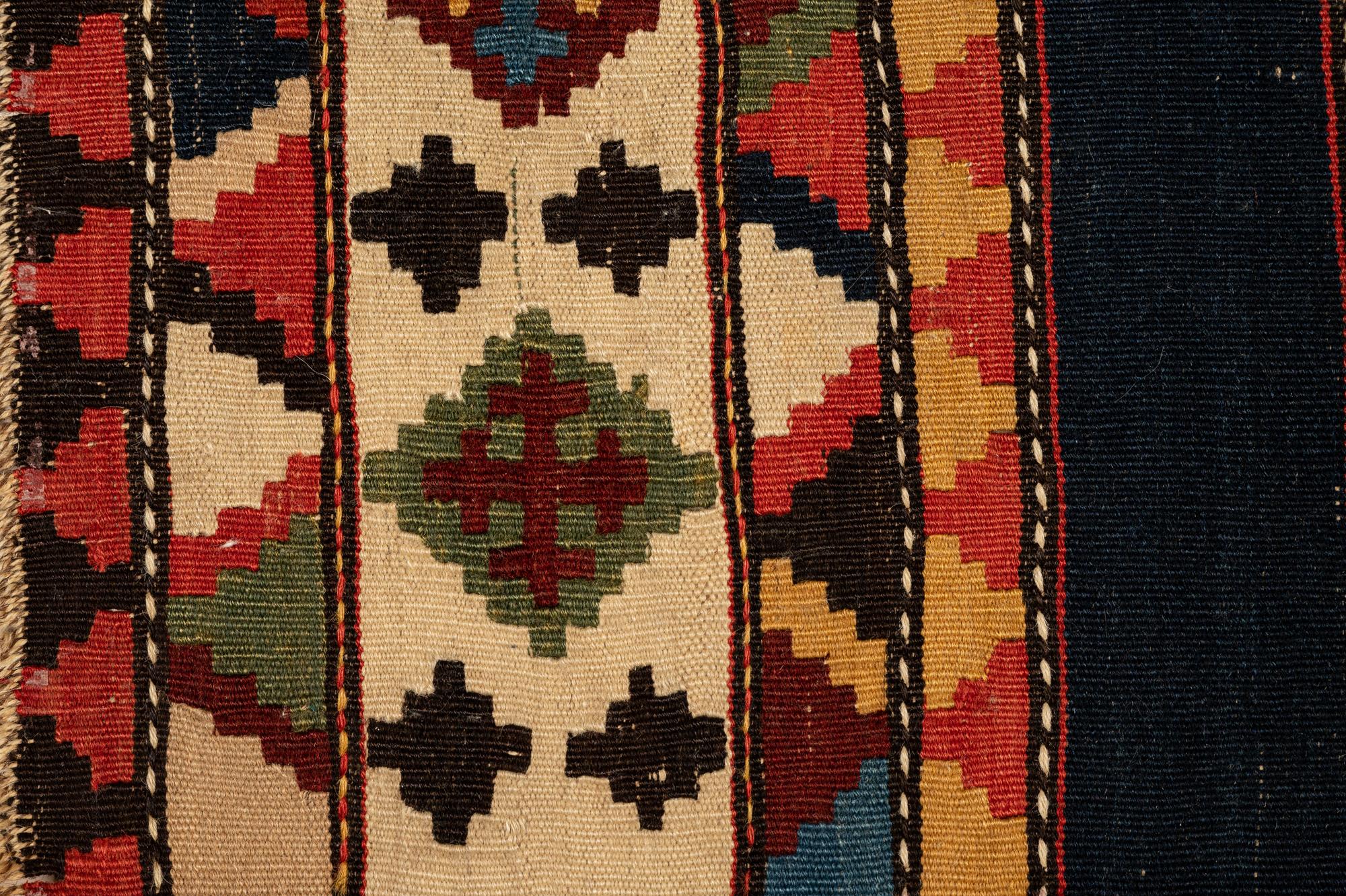 A Group of Three Kilim Rugs