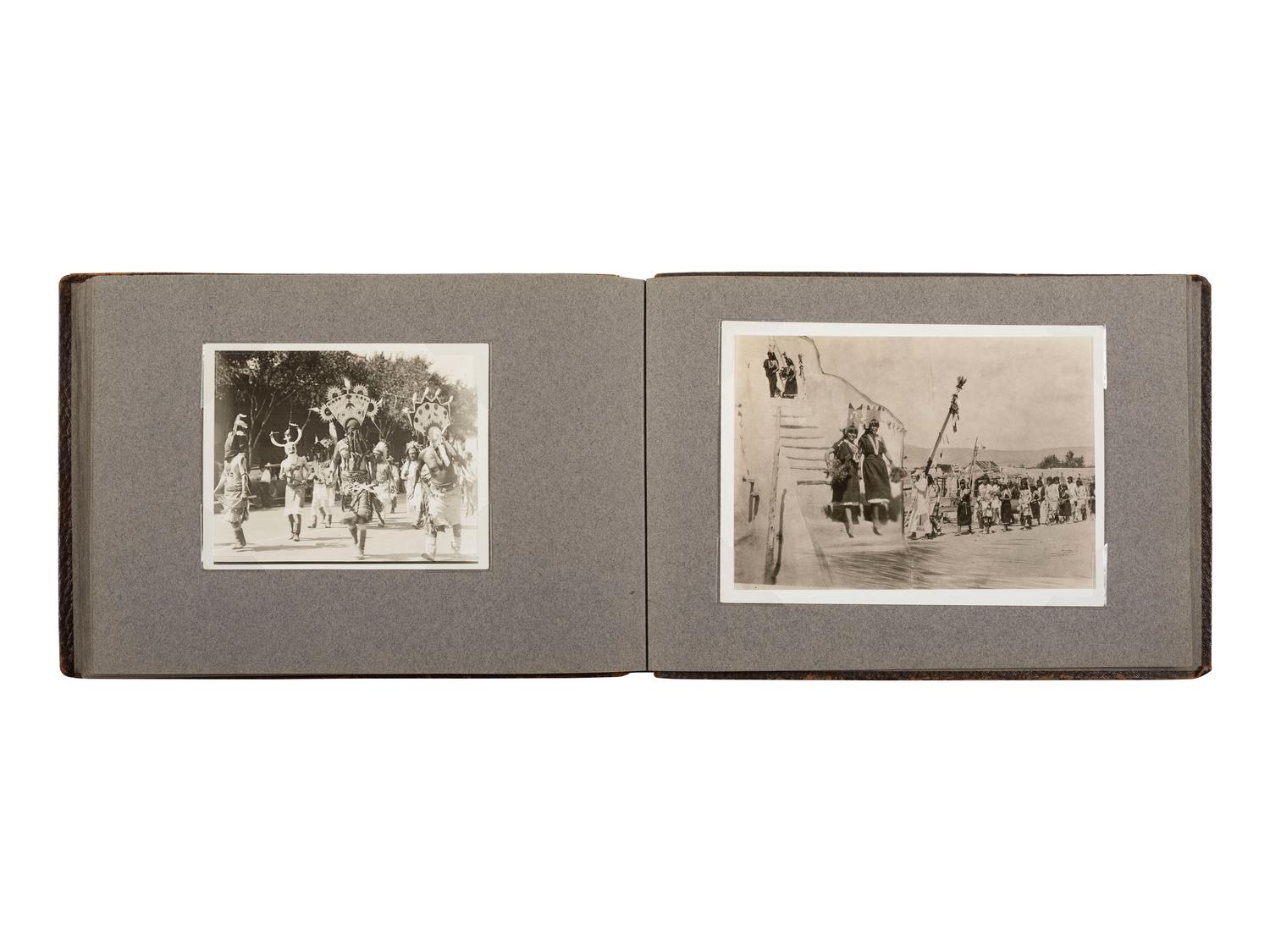[NATIVE AMERICANS]. JONES, John Edward (1863-1922), photographer. Album containing 50 photographs of the San Carlos Indian Agency, including Apache civilians and police, agency buildings and dwellings, and scenic views. Ca 1904.