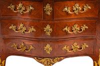 A Régence Gilt Bronze Mounted Tulipwood Marble-Top Commode