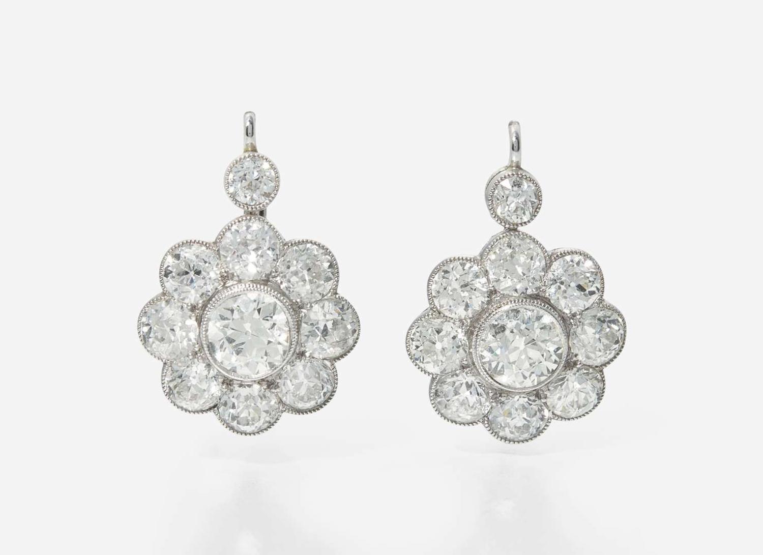 A Pair of 14K White Gold and Diamond Earrings