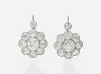A Pair of 14K White Gold and Diamond Earrings