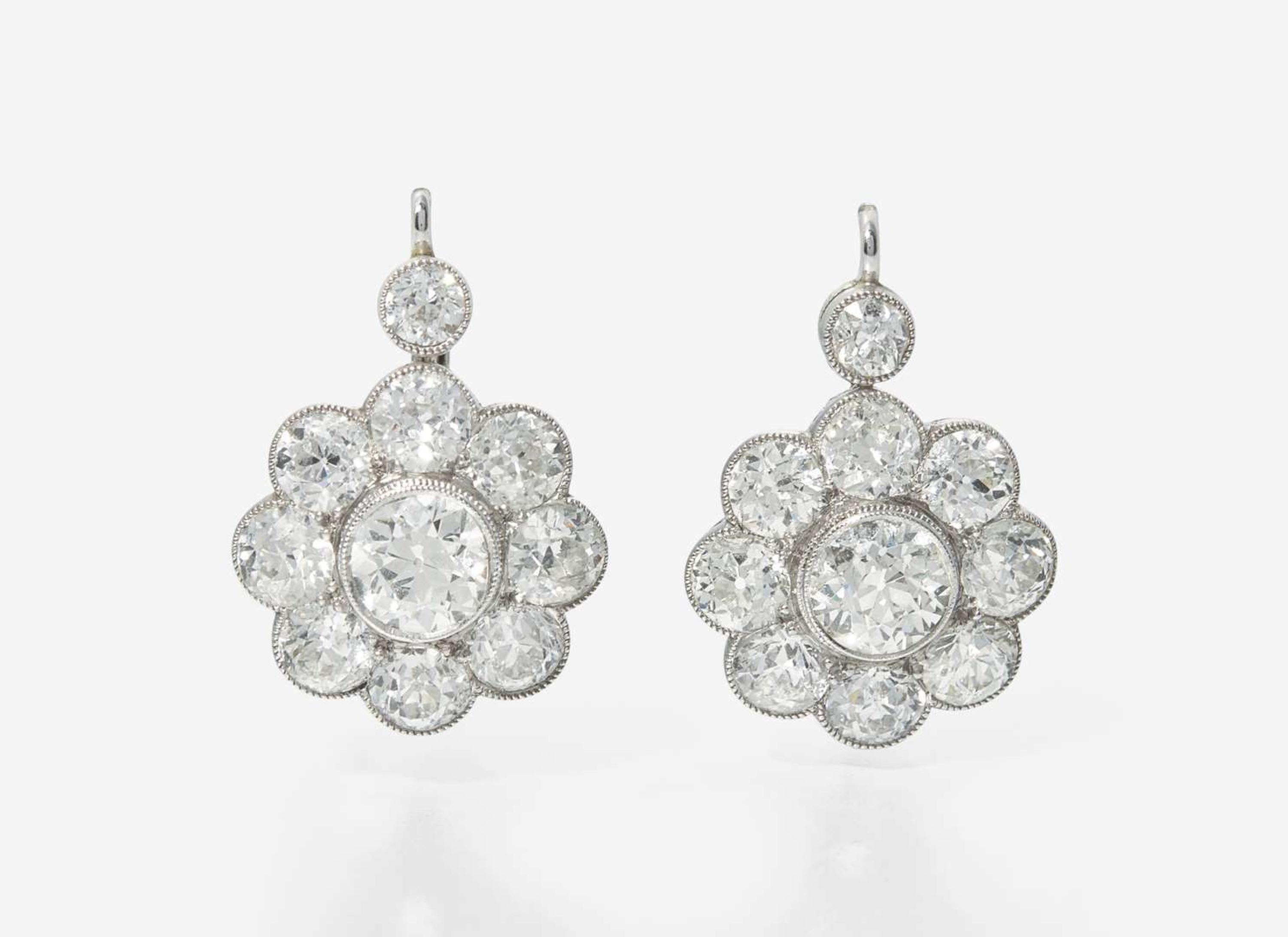 A Pair of 14K White Gold and Diamond Earrings