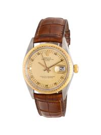 ROLEX, REF. 1512 STAINLESS STEEL AND 18K ENGINE TURNED YELLOW GOLD BEZEL 'DATE' 'ZEPHYR' WATCH, CIRCA 1970