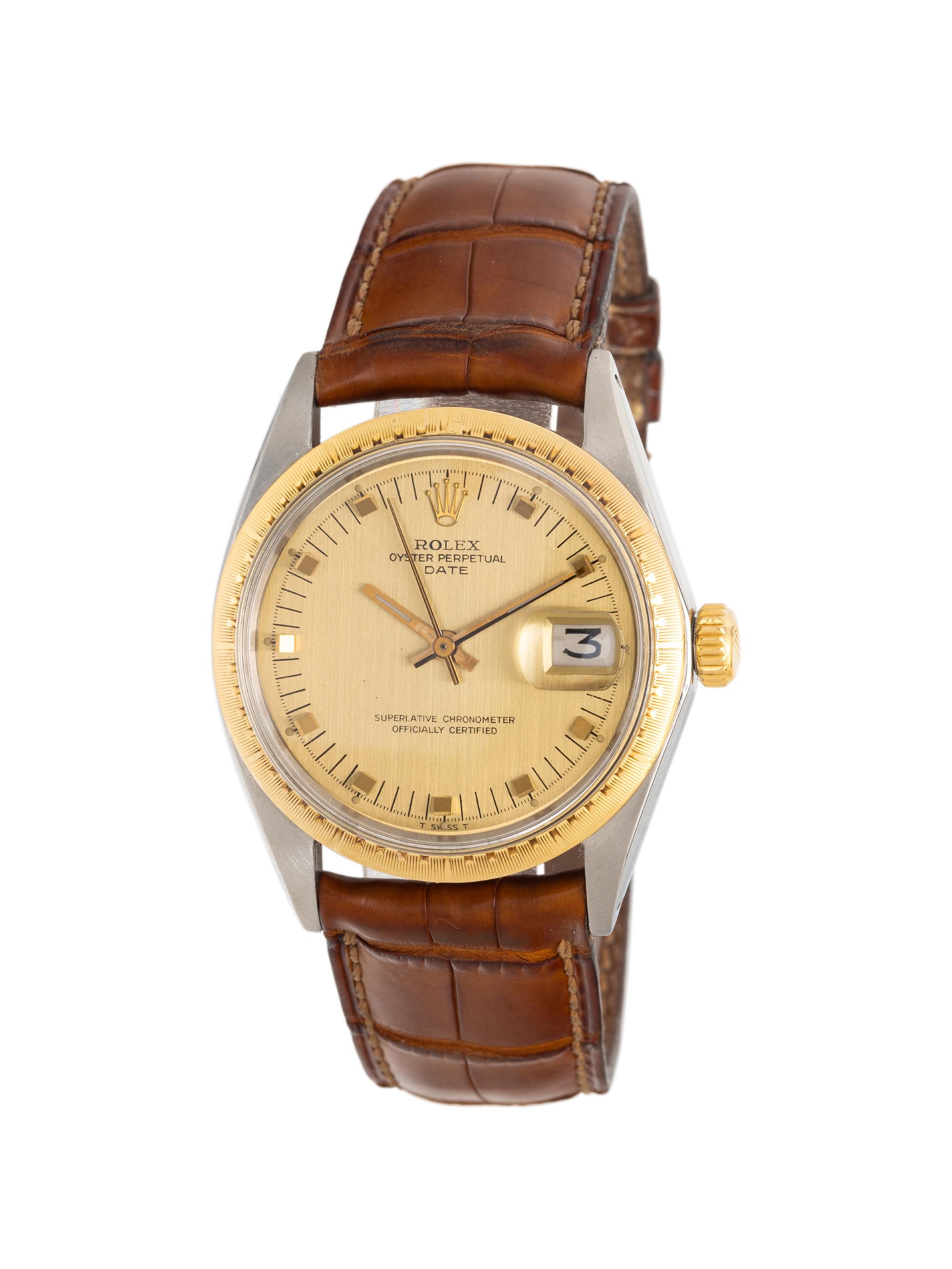 ROLEX, REF. 1512 STAINLESS STEEL AND 18K ENGINE TURNED YELLOW GOLD BEZEL 'DATE' 'ZEPHYR' WATCH, CIRCA 1970