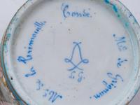 Three Sèvres Painted, Parcel Gilt and "Jeweled" Celeste Blue-Ground Porcelain Teacups and Saucers