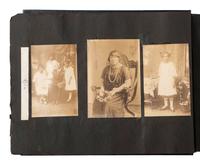 [EARLY PHOTOGRAPHY]. Album containing photos of a multi-generational African American family in Washington, DC. Ca early-to-mid 20th Century.