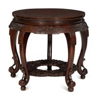 A Chinese Carved Hardwood Center Table and Four Matching Low Stools/Pedestals