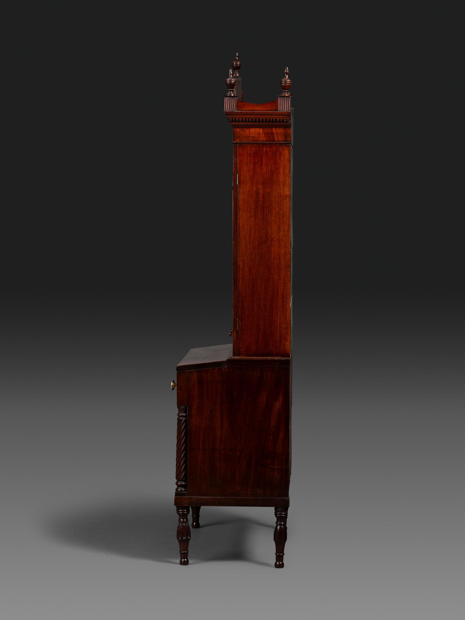 A Federal Carved and Figured Mahogany Lady's Writing Desk
