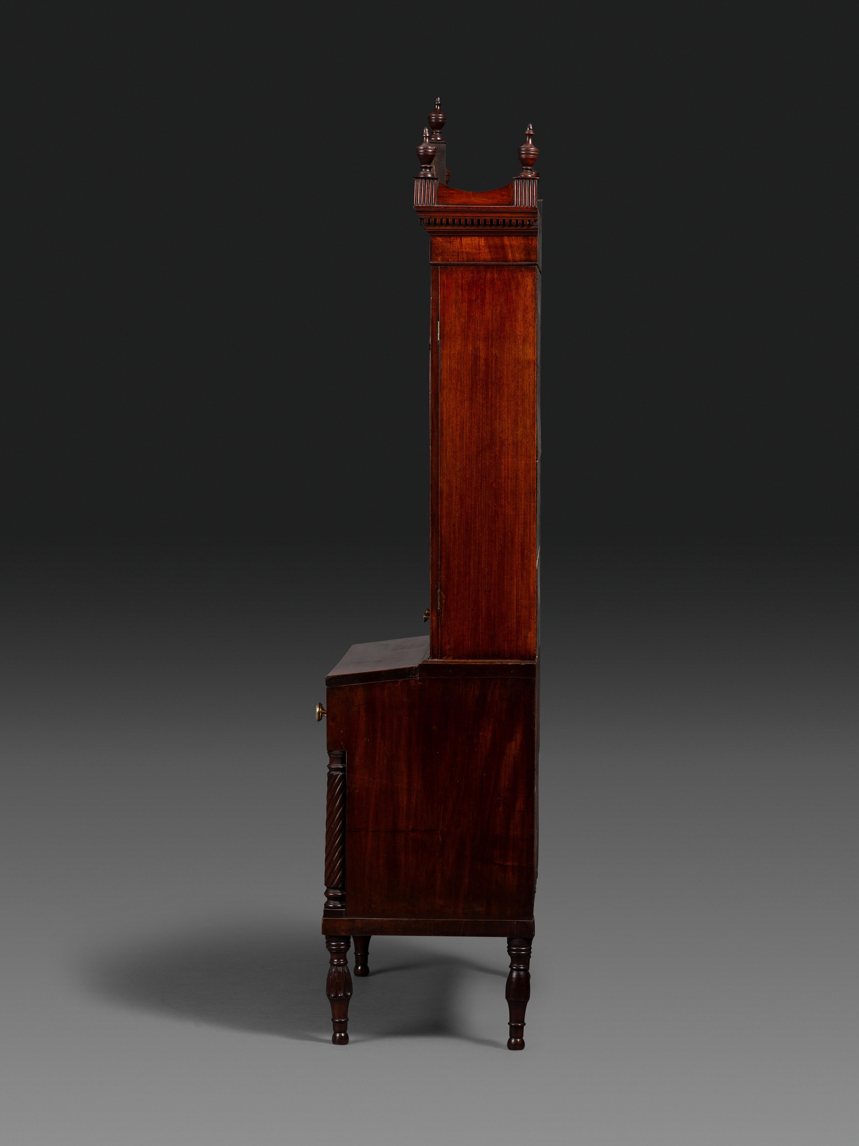 A Federal Carved and Figured Mahogany Lady's Writing Desk