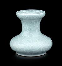 A Pale Celadon Glazed Molded Flower Pot