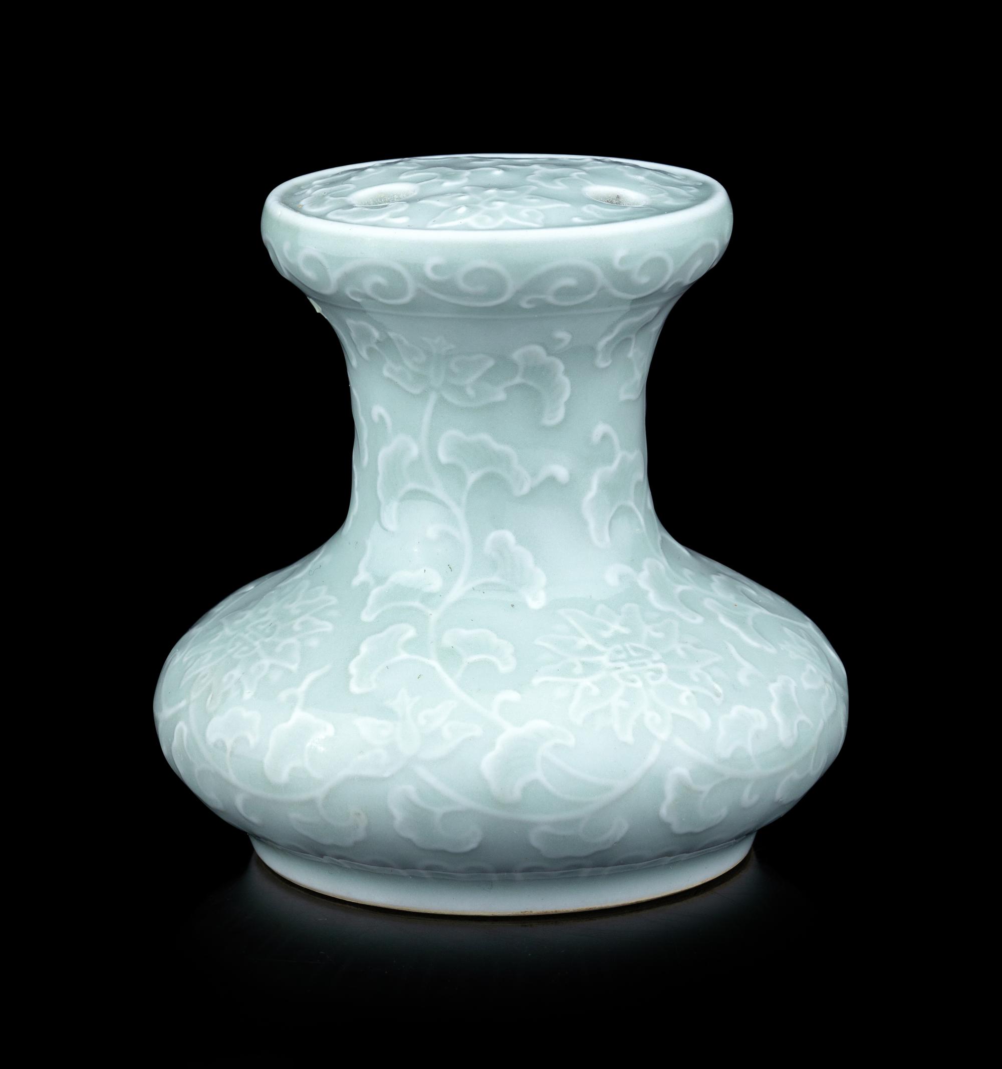 A Pale Celadon Glazed Molded Flower Pot