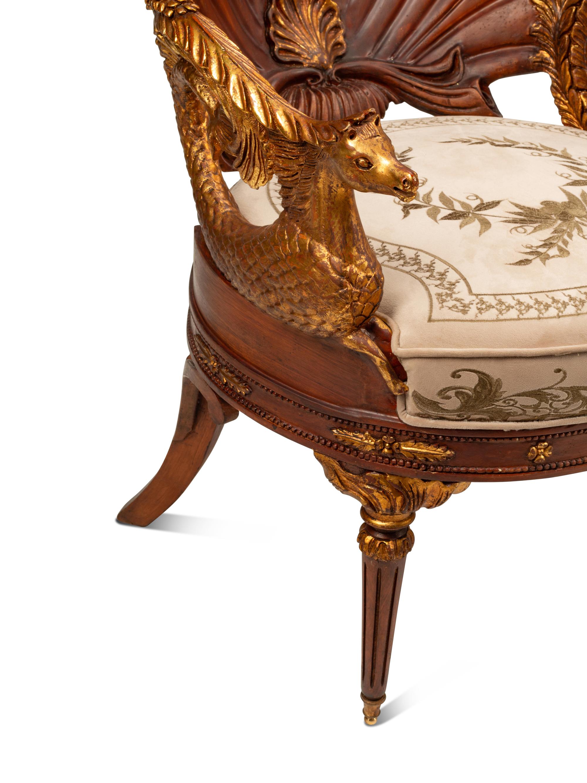 A Pair of Grotto Style Parcel Gilt Carved Walnut Armchairs