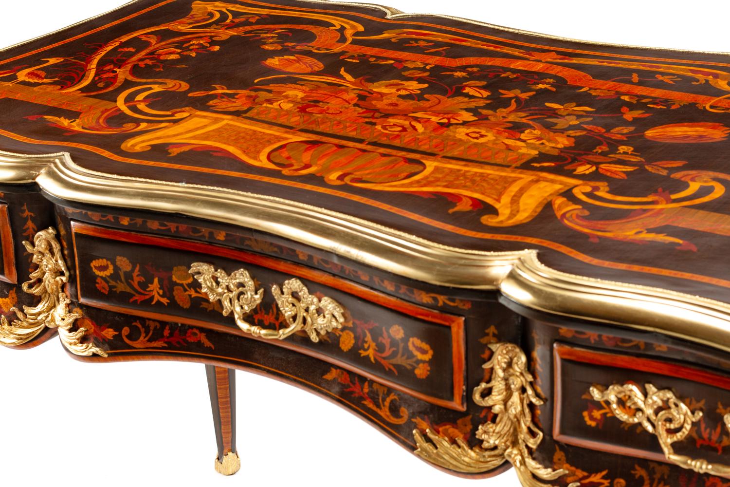 A Louis XV Style Gilt Bronze Mounted Marquetry Bureau Plat