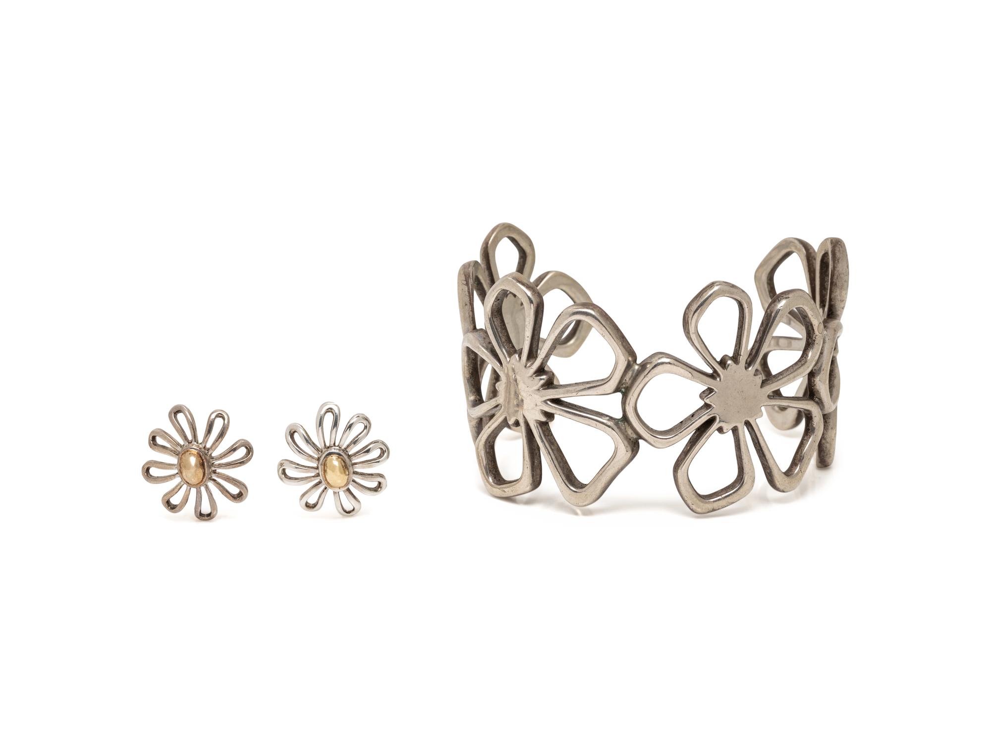 TIFFANY & CO., COLLECTION OF STERLING SILVER AND YELLOW GOLD FLORAL JEWELRY
