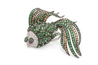 An 18 Karat White, Blackened Gold, Multigem and Diamond Fish Brooch,