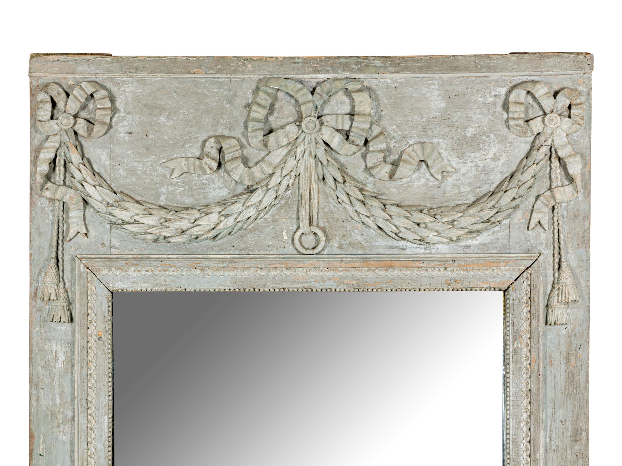 A Louis XVI Grey-Painted and Carved Trumeau