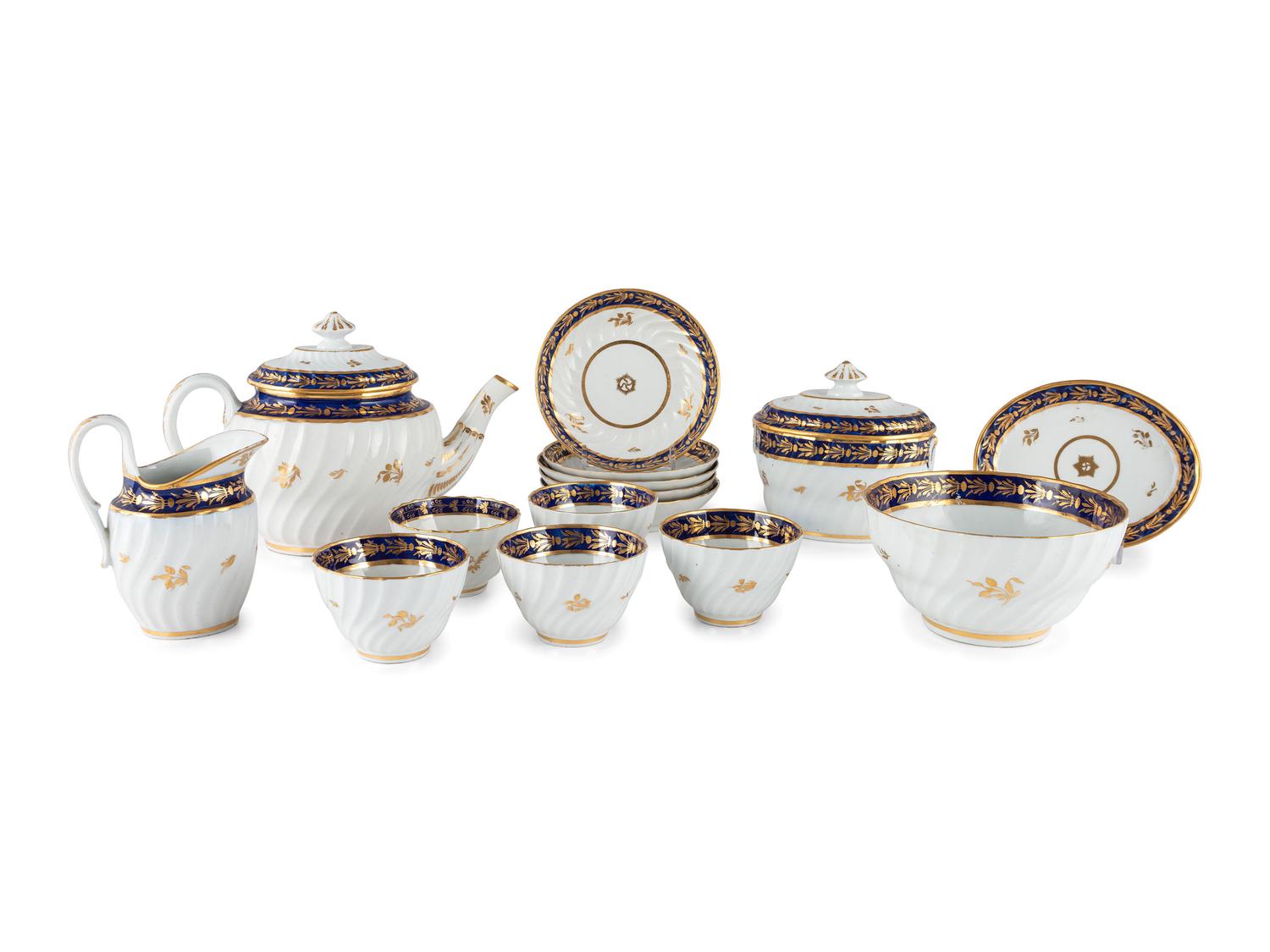 An English Gilt and Cobalt Decorated Porcelain Tea Service