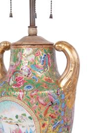A Chinese Export Parcel Gilt and Faux Marble Decorated Famille Rose Porcelain Pistol-Handled Urn