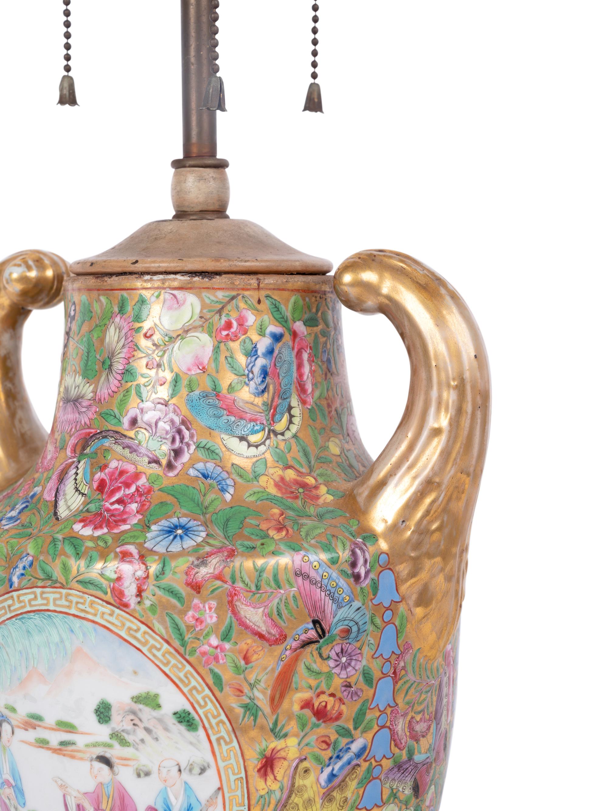 A Chinese Export Parcel Gilt and Faux Marble Decorated Famille Rose Porcelain Pistol-Handled Urn