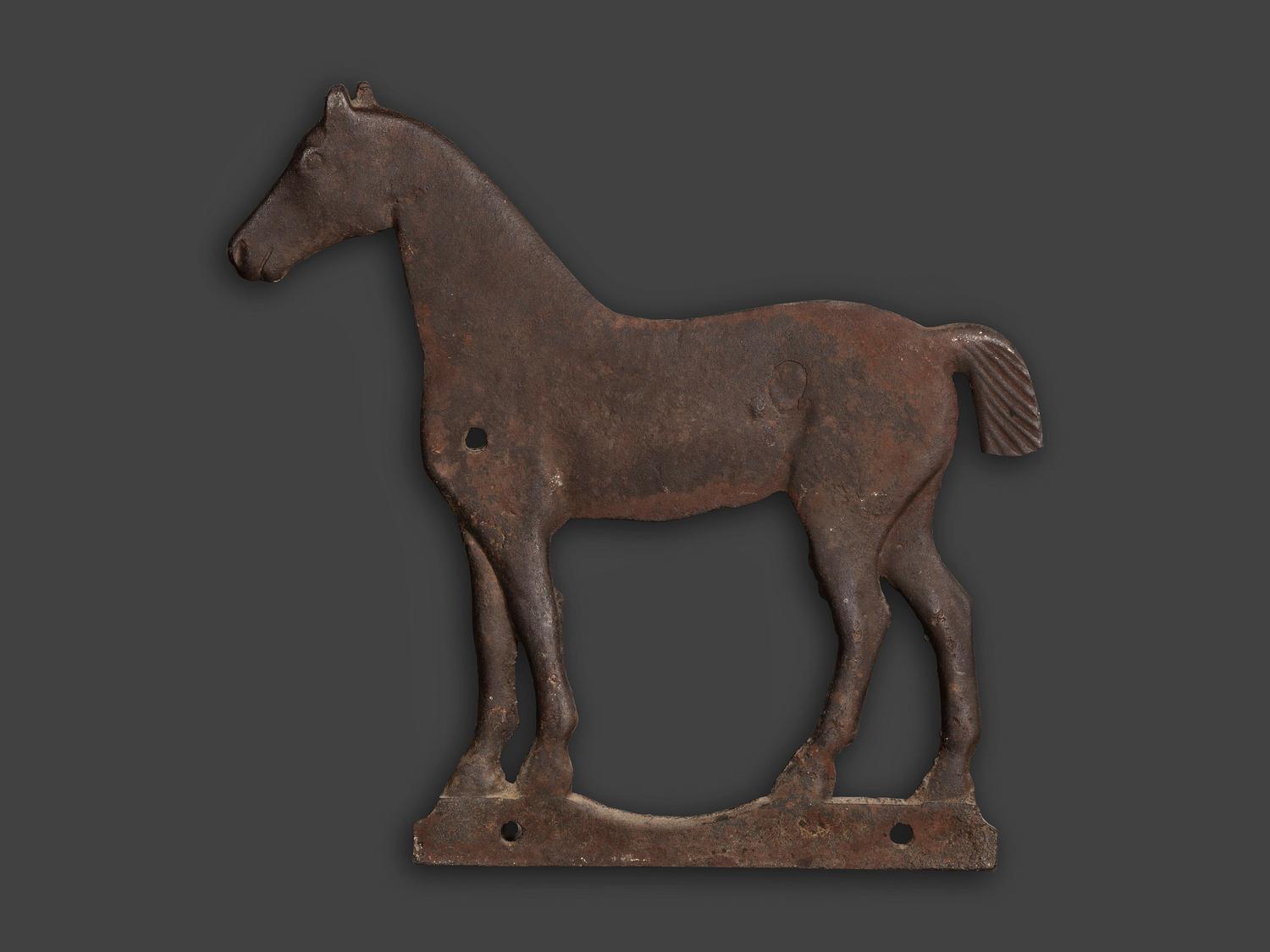 A Cast Iron Horse Windmill Weight