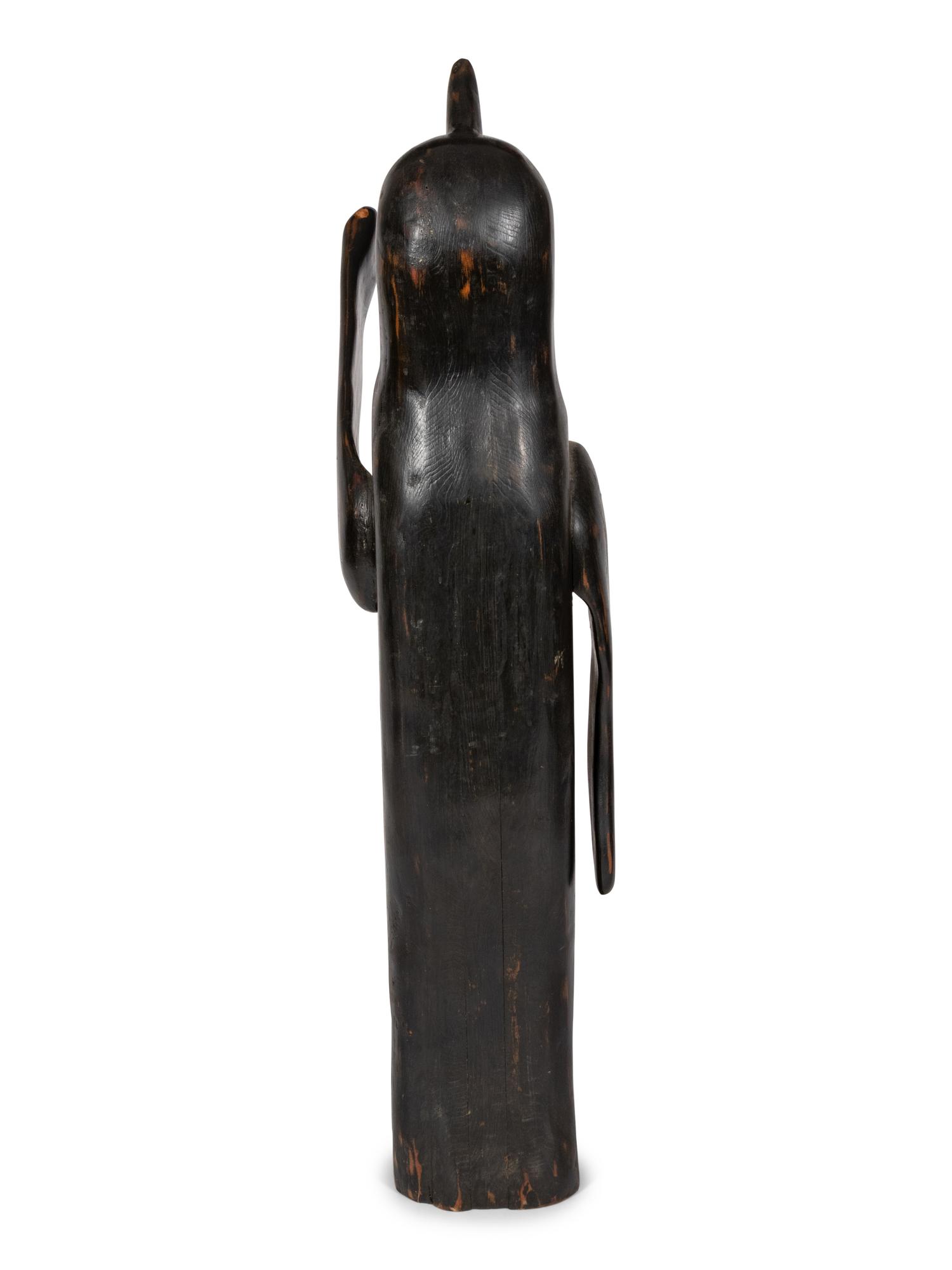 A Folk Art Carved Penguin