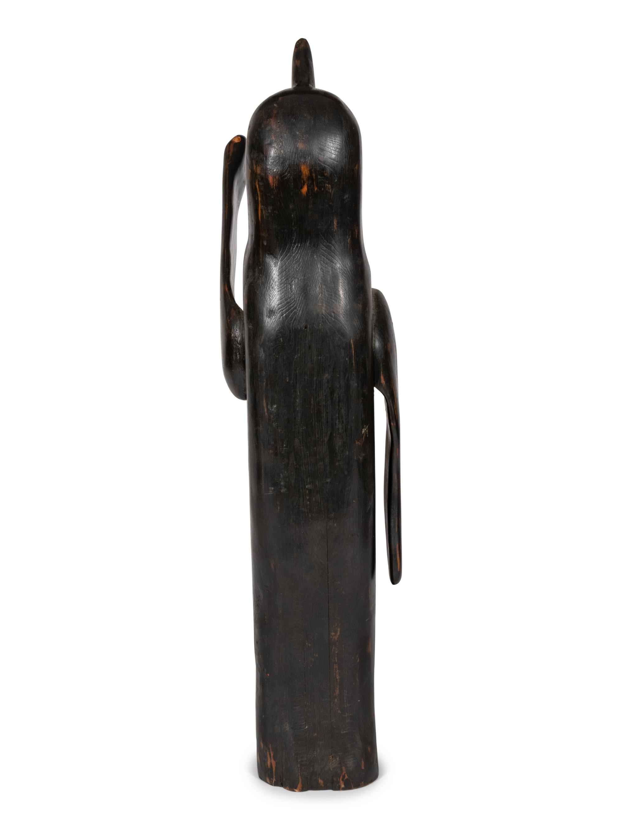 A Folk Art Carved Penguin