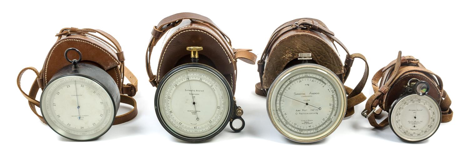 A Group of Four Surveying Aneroids Diameter of largest 4 3/4 inches. — VARIOUS MAKERS, LONDON, 20TH CENTURY