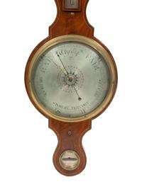A Regency Crossbanded Mahogany Wheel Barometer