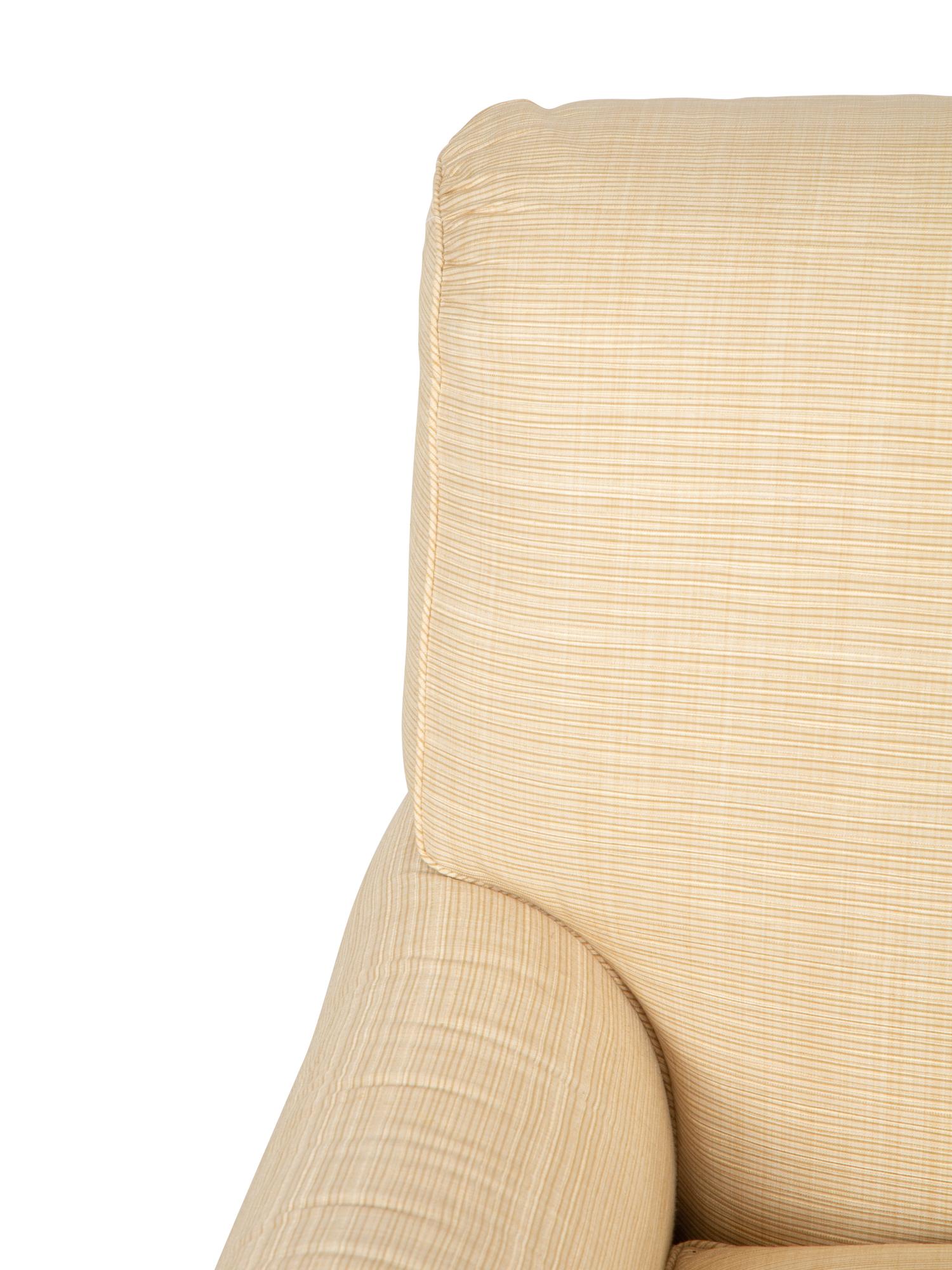 A Contemporary Upholstered Club Chair with Ribbed Upholstery