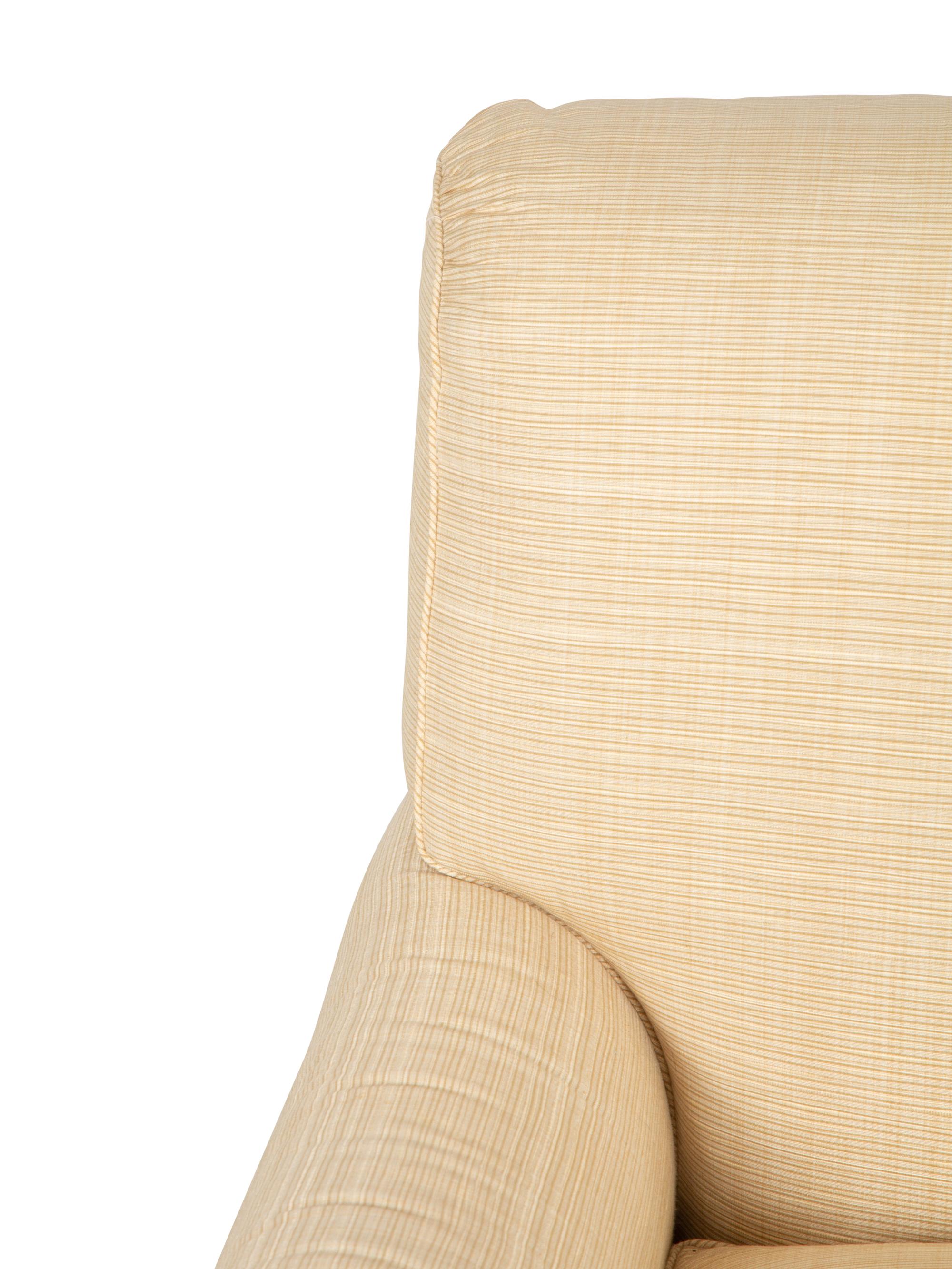 A Contemporary Upholstered Club Chair with Ribbed Upholstery