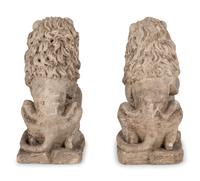 A Pair of Cast Stone Lion Figures